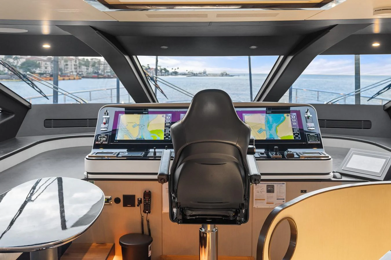 The helm station offers a commanding view with state-of-the-art navigation equipment and luxurious seating. aboard AZIMUT GRANDE 32/23 Yacht for Sale