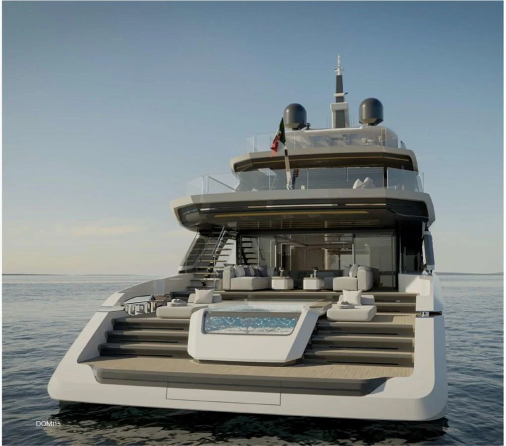The yacht's aft deck features luxurious seating and a stunning pool, perfect for relaxation and entertainment. aboard BAGLIETTO DOM115 Yacht for Sale