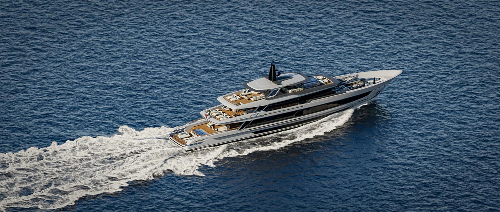 A sleek and modern yacht cruises through the open sea, showcasing its luxurious design and spacious decks. aboard BAGLIETTO T54 Yacht for Sale