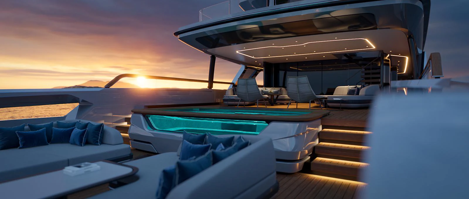 The aft deck of this yacht features a luxurious seating area and a beautifully lit pool, perfect for sunset relaxation. aboard BAGLIETTO T54 Yacht for Sale