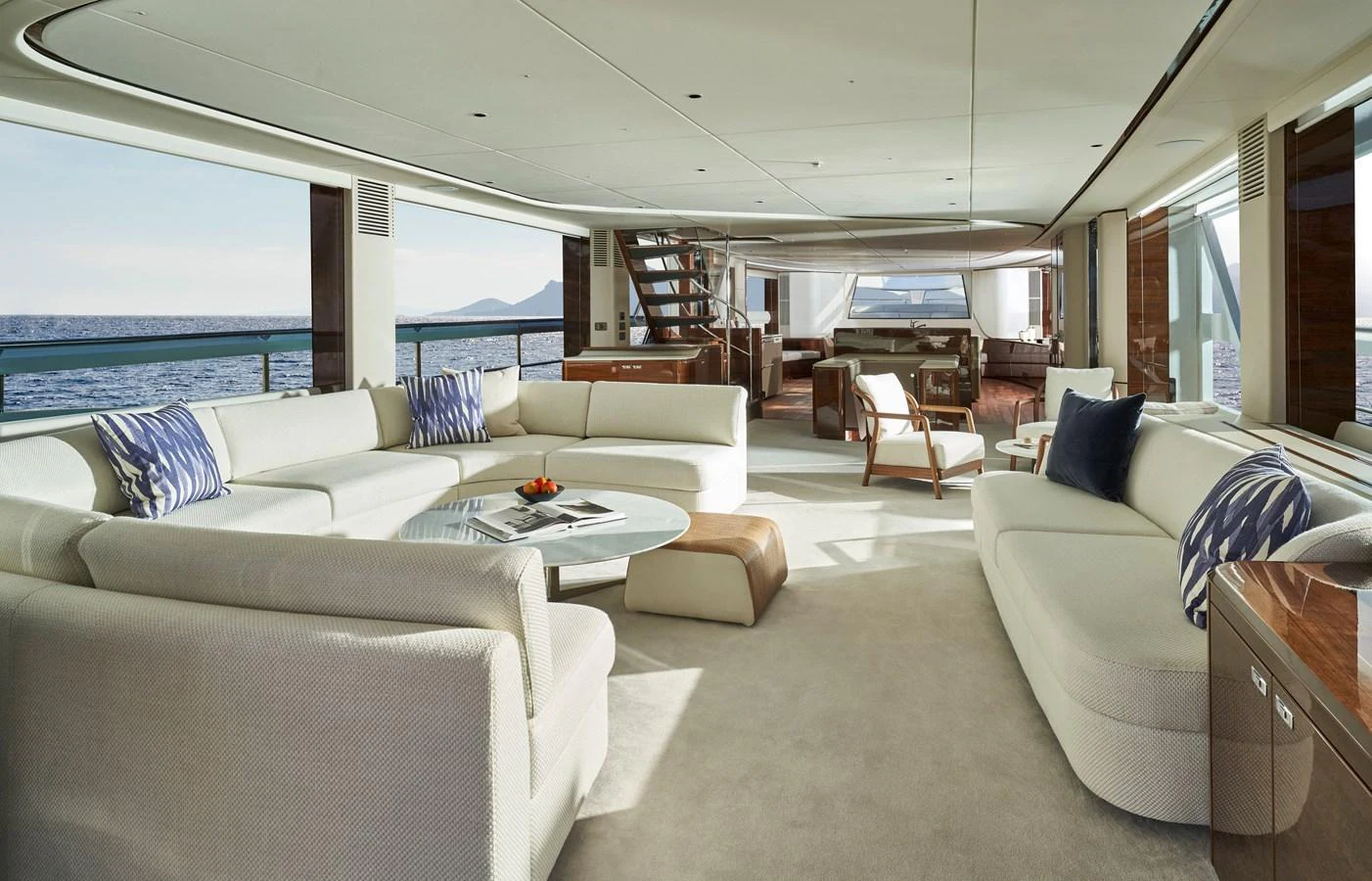 The spacious salon offers panoramic views and luxurious seating for relaxation. aboard PRINCESS X95 VISTA Yacht for Sale