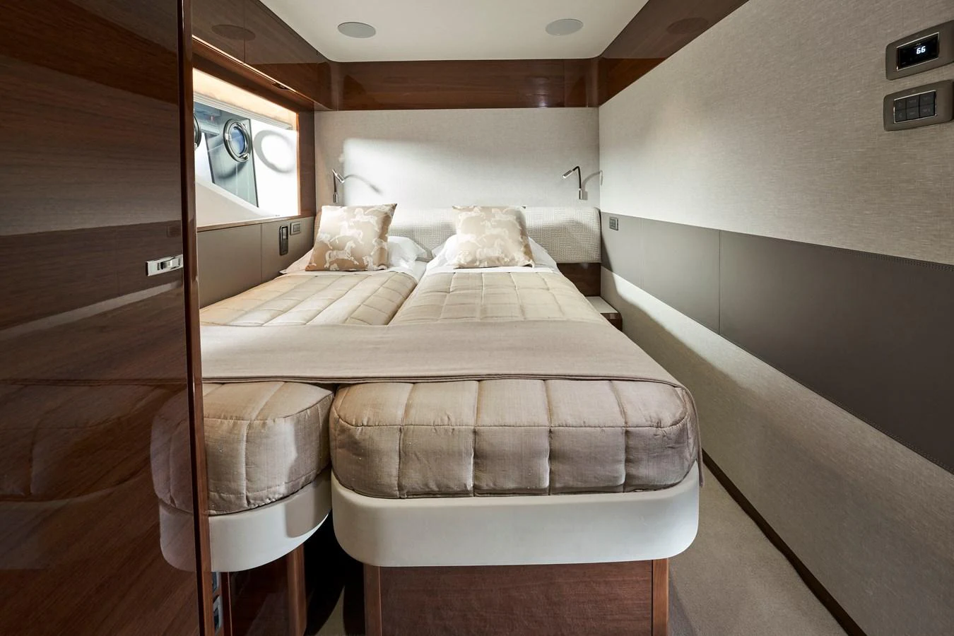 The stateroom features twin beds with plush bedding and modern decor. aboard PRINCESS X95 VISTA Yacht for Sale