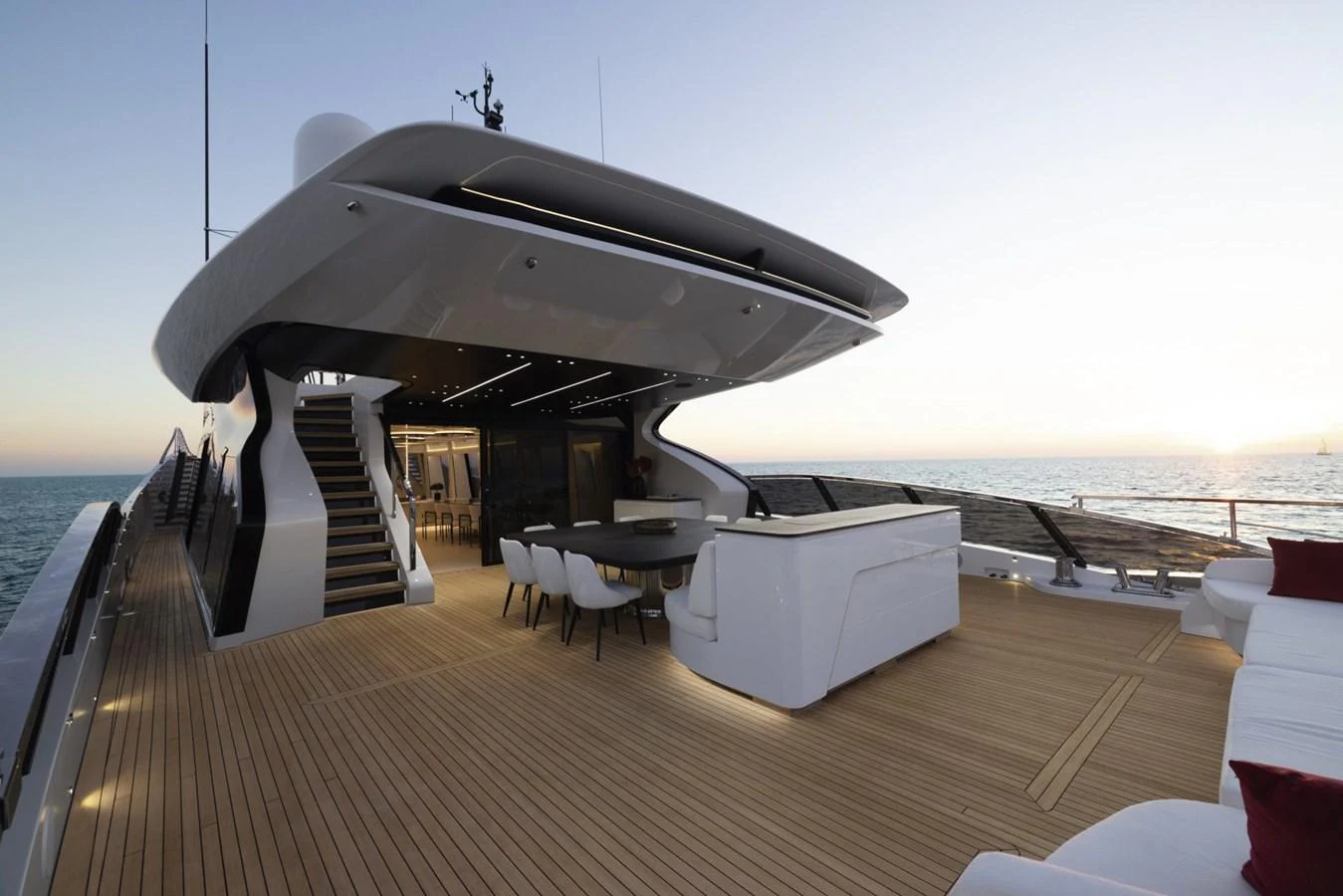 The aft deck offers a spacious and elegant area for dining and relaxation with stunning ocean views. aboard REBELLIOUS Yacht for Sale