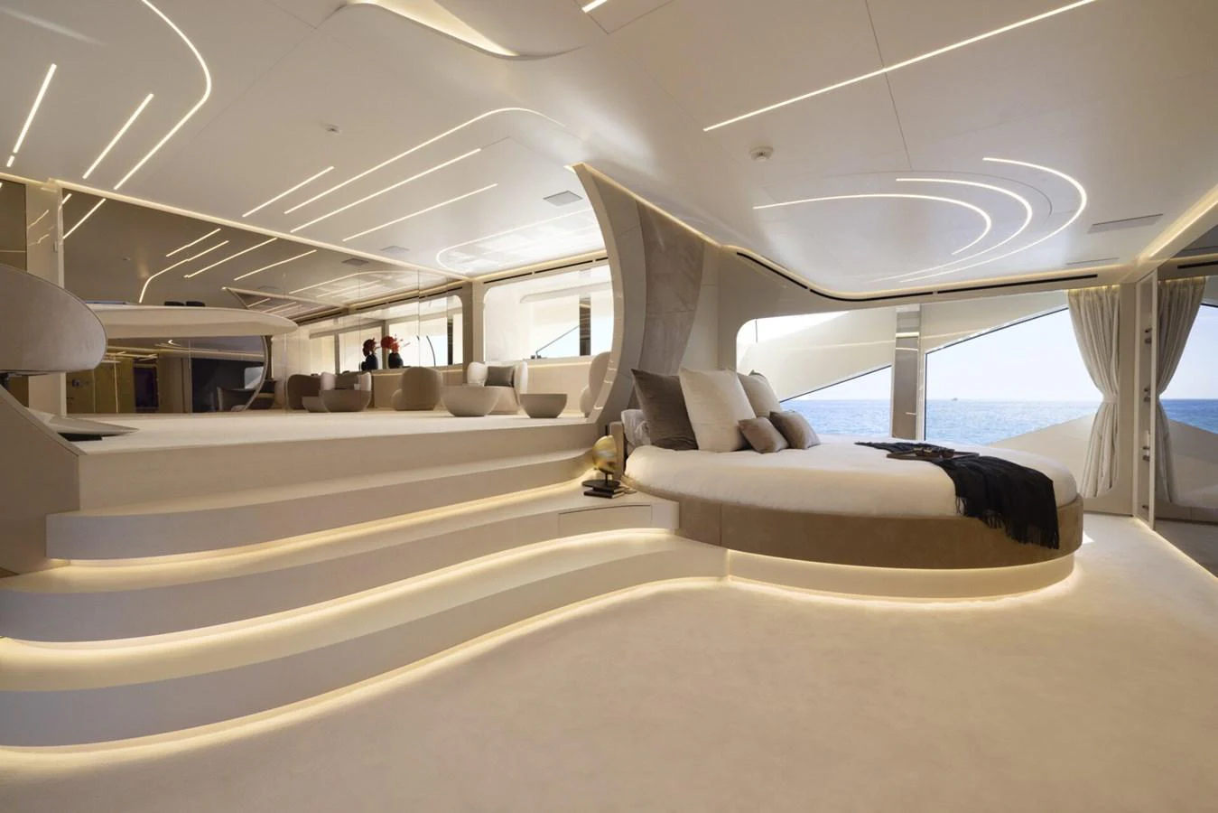 The master stateroom features a luxurious, modern design with ample natural light and elegant furnishings. aboard REBELLIOUS Yacht for Sale