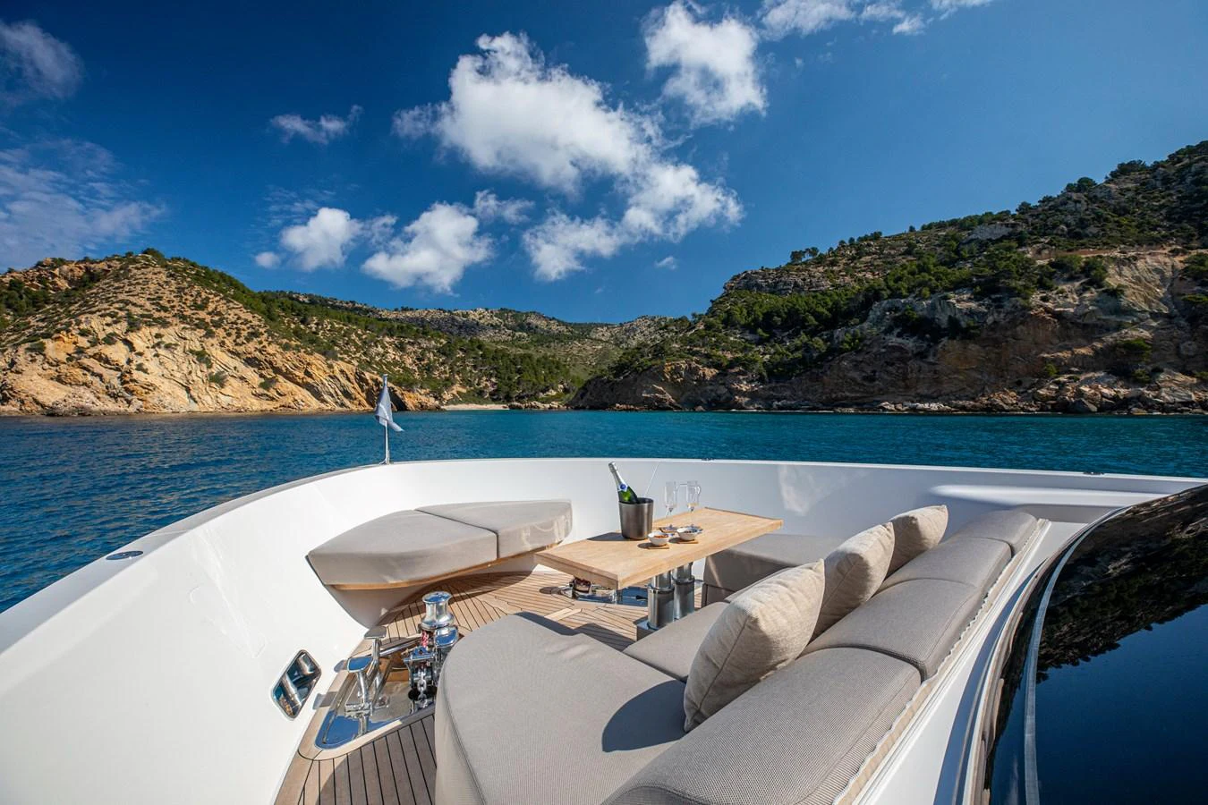 The foredeck offers a luxurious lounging area with stunning views of the surrounding seascape. aboard SEVEN Yacht for Sale