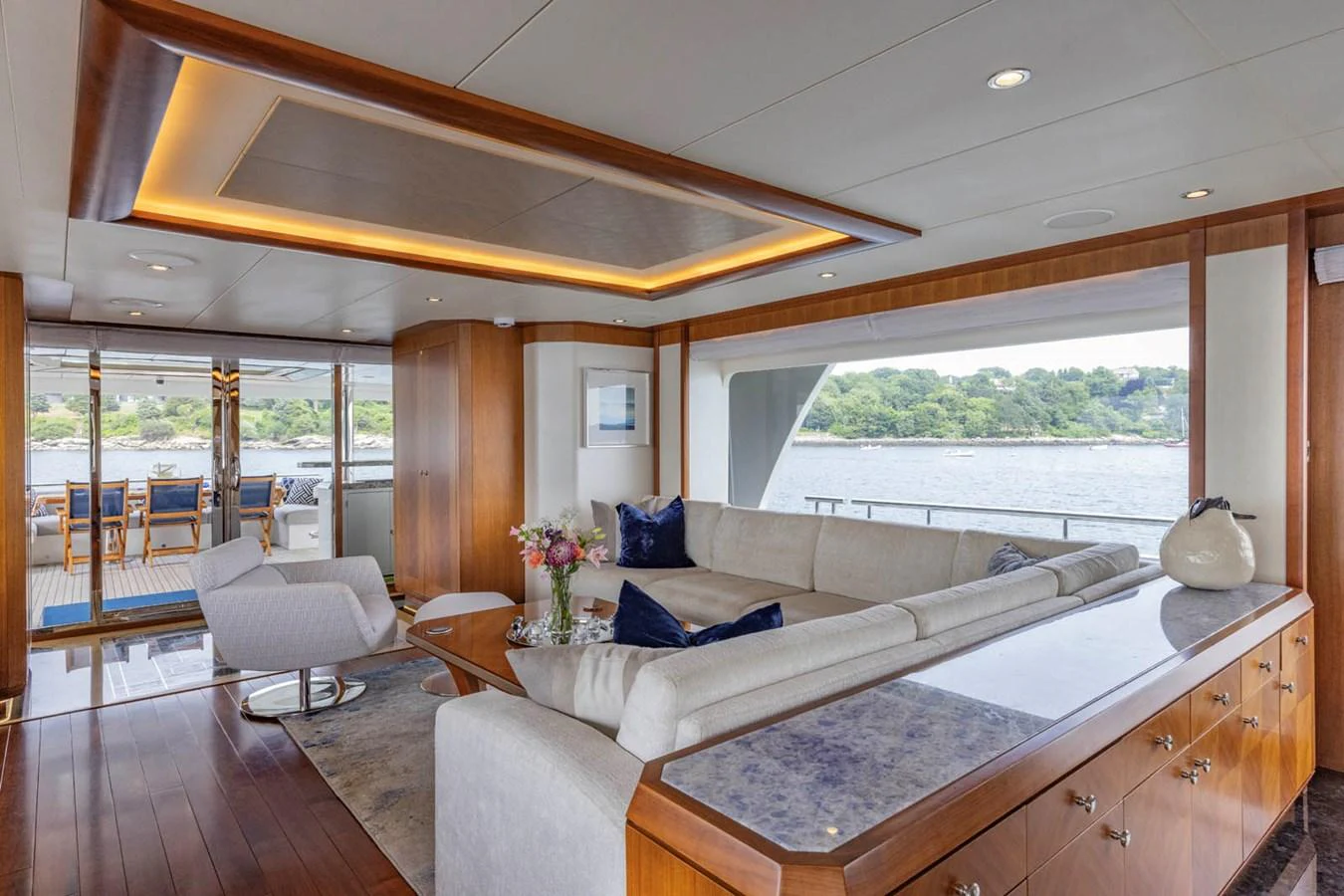 The salon offers a spacious and elegant seating area with panoramic views of the surrounding waters. aboard WRECKLESS Yacht for Sale