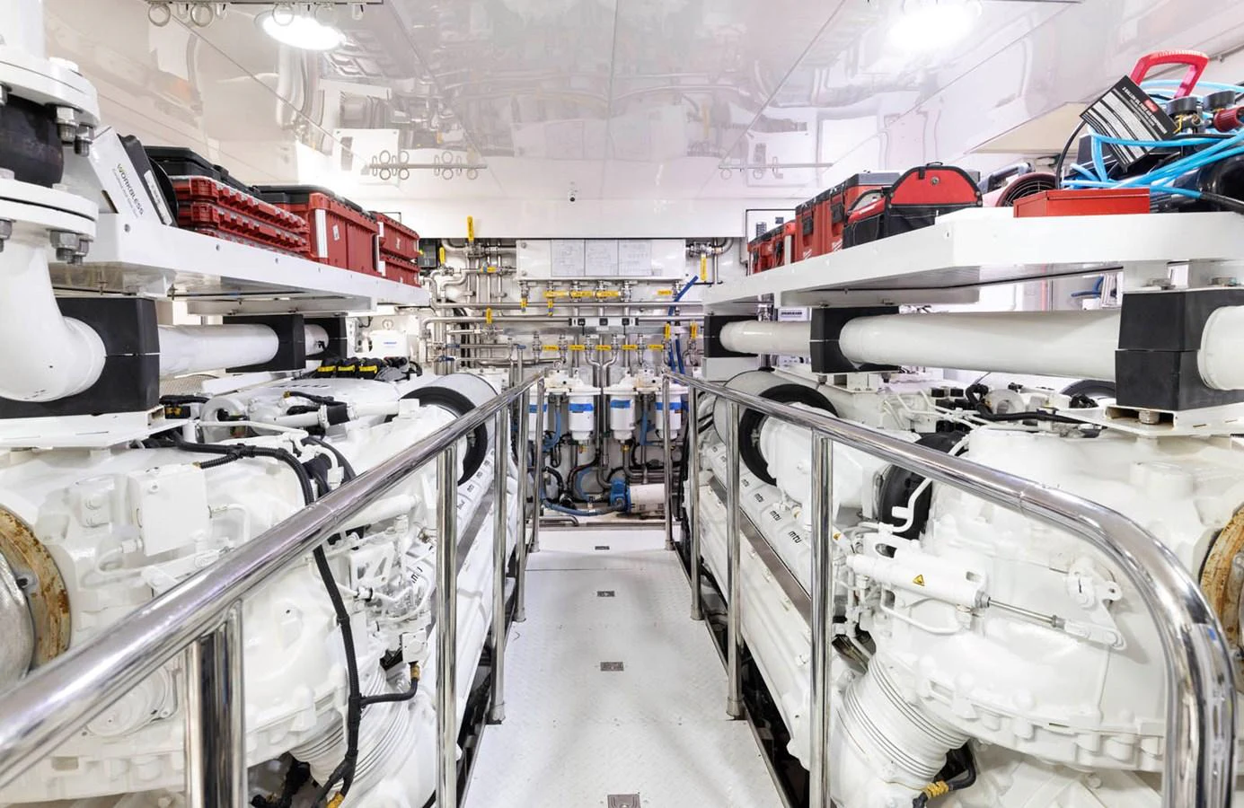 The image showcases the pristine and well-organized engine room of the yacht, highlighting its advanced machinery and equipment. aboard WRECKLESS Yacht for Sale