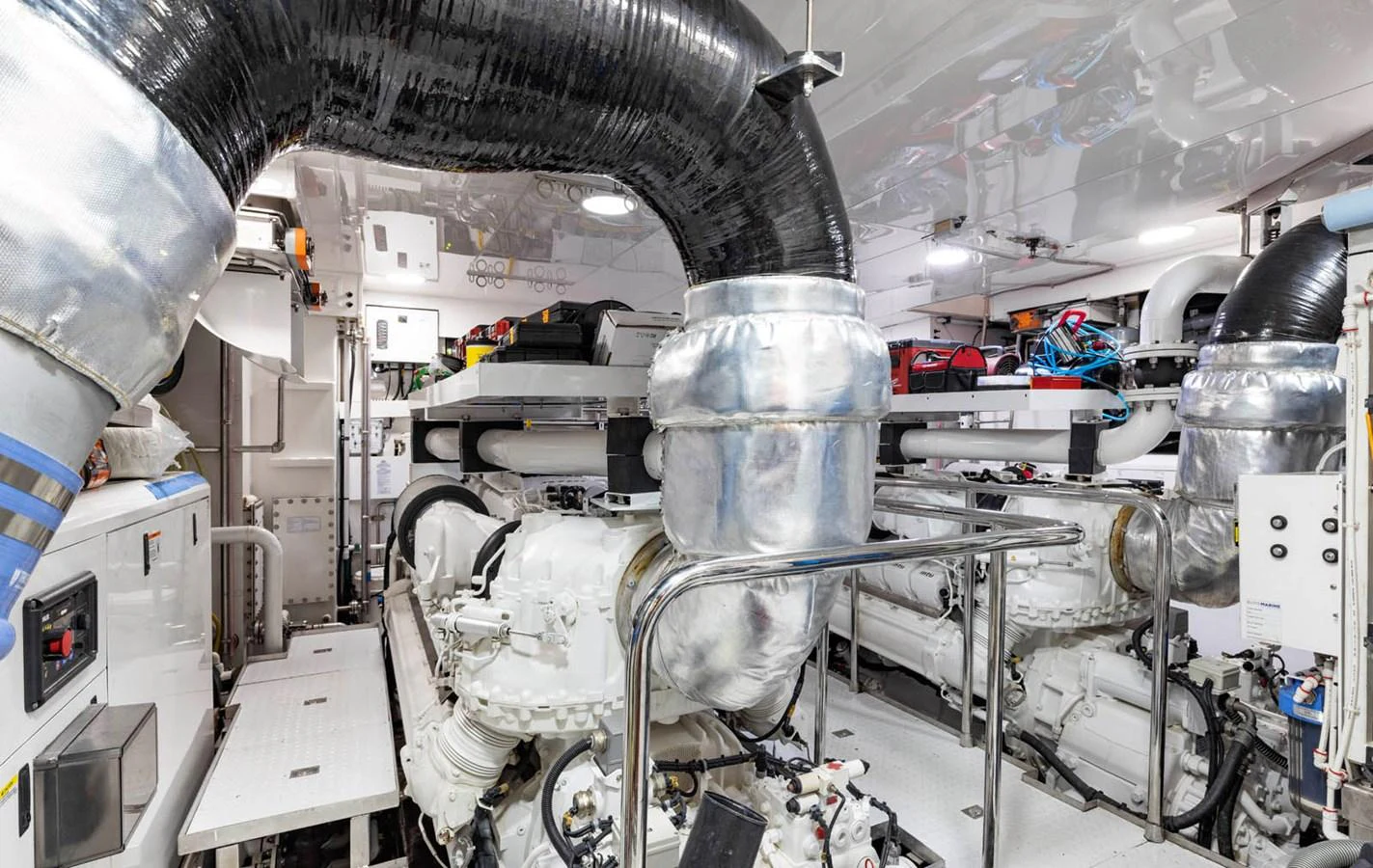 The engine room showcases the yacht's powerful and meticulously maintained machinery. aboard WRECKLESS Yacht for Sale