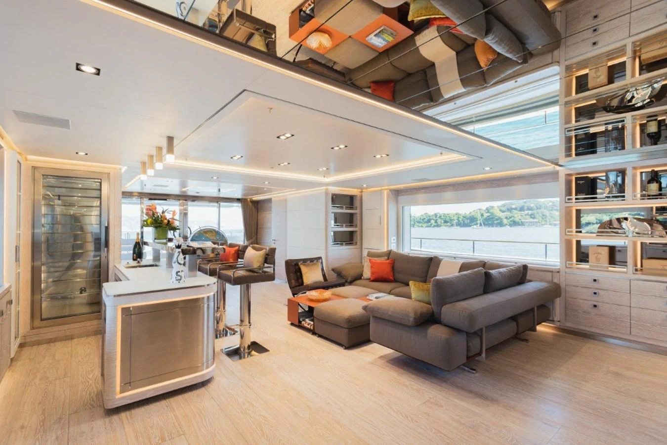 The spacious salon features modern furnishings and large windows offering stunning views. aboard PICK UP Yacht for Sale