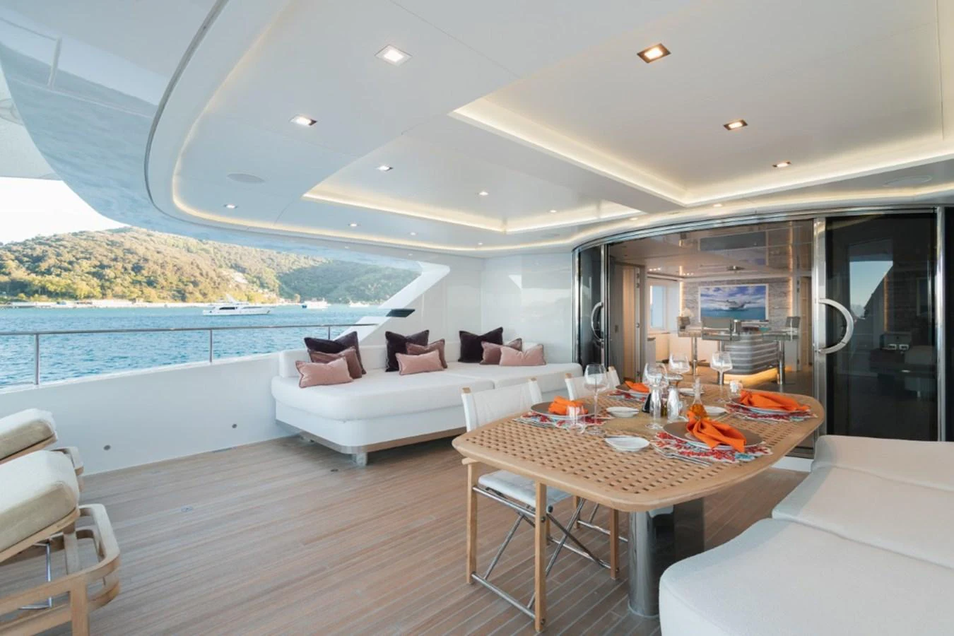 The aft deck offers a luxurious dining and lounging area with stunning views of the water. aboard PICK UP Yacht for Sale