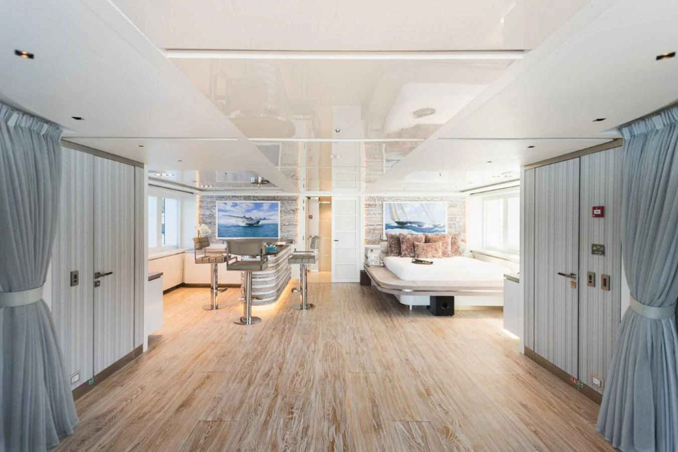 The yacht's interior features a spacious and elegantly designed area with modern decor and ample natural light. aboard PICK UP Yacht for Sale