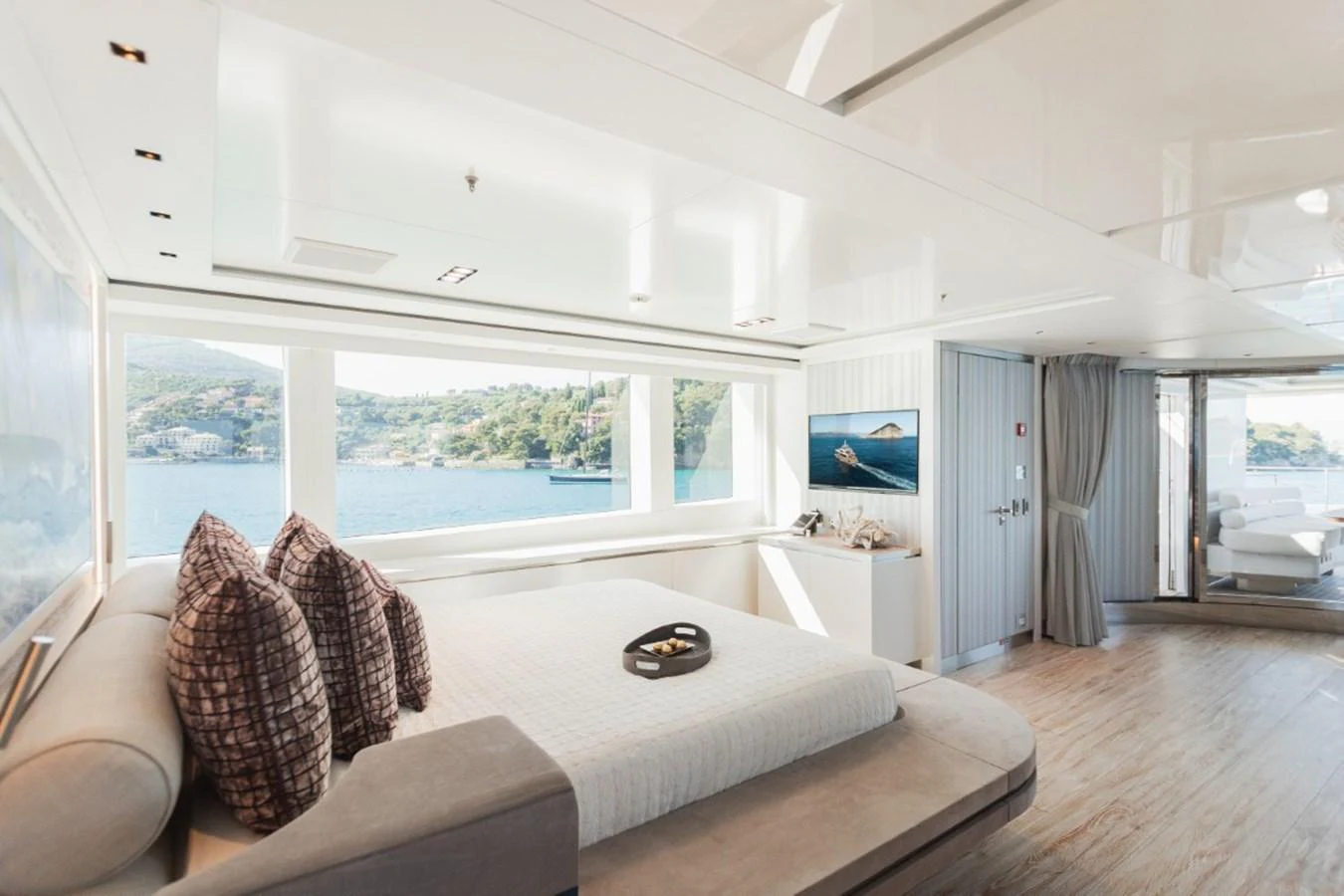 The master stateroom offers a luxurious and serene retreat with panoramic views of the surrounding waters. aboard PICK UP Yacht for Sale