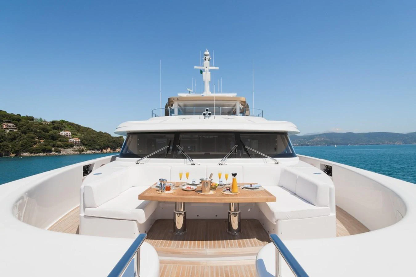 The foredeck features a spacious dining area with a stunning ocean view. aboard PICK UP Yacht for Sale