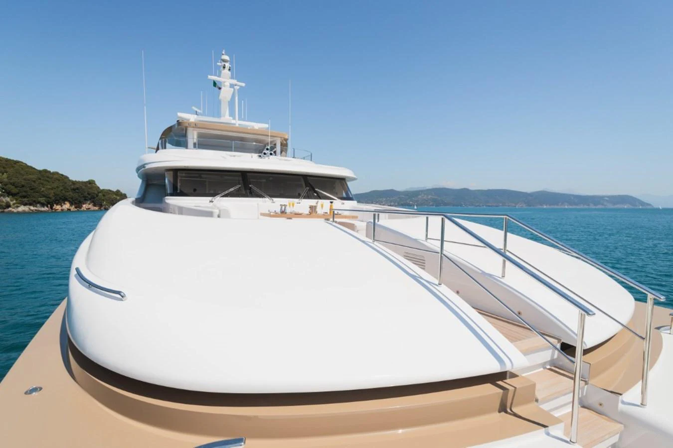A sleek and modern yacht with a spacious deck and stunning views of the surrounding waters. aboard PICK UP Yacht for Sale