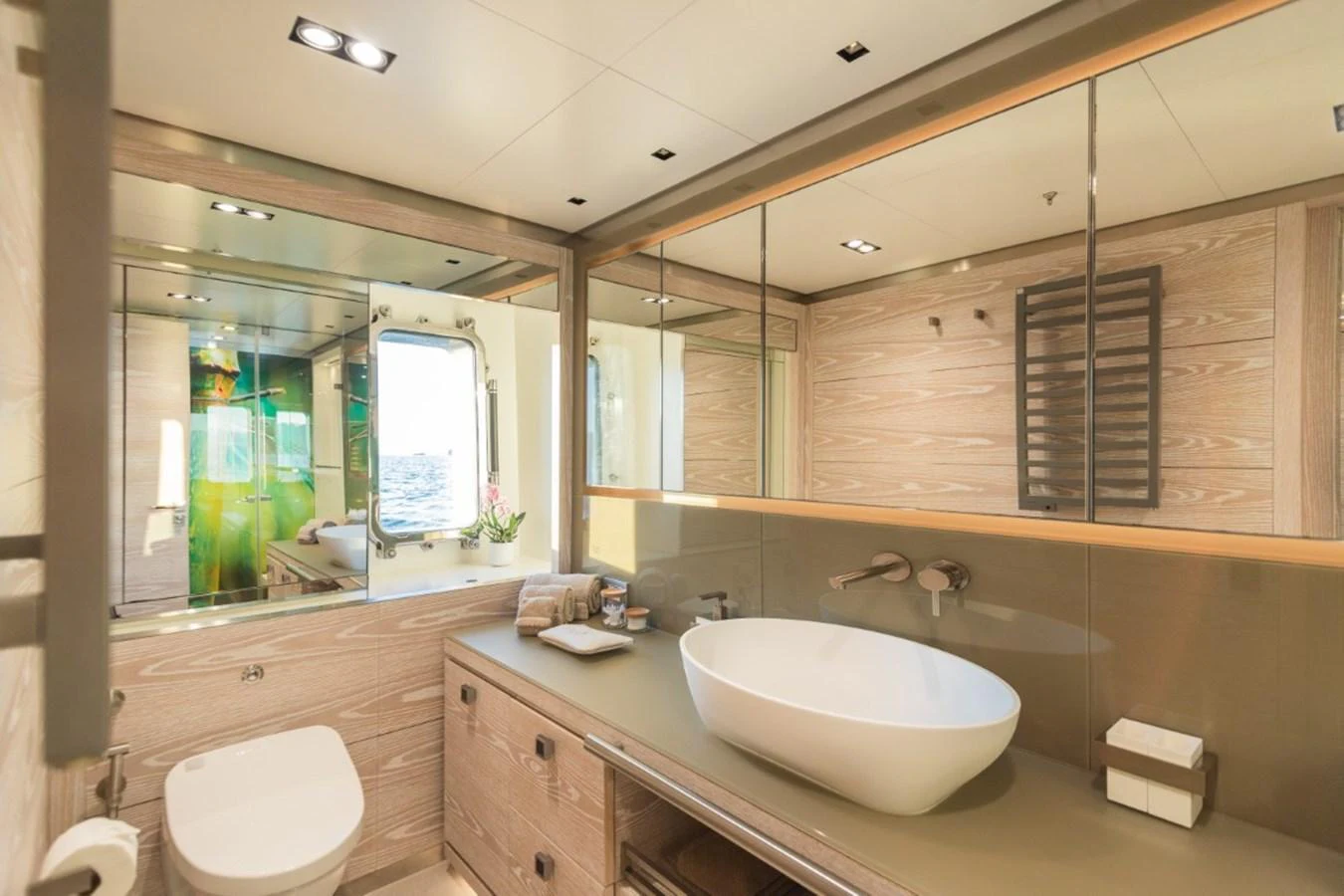 The yacht's bathroom features modern fixtures and a serene ambiance. aboard PICK UP Yacht for Sale