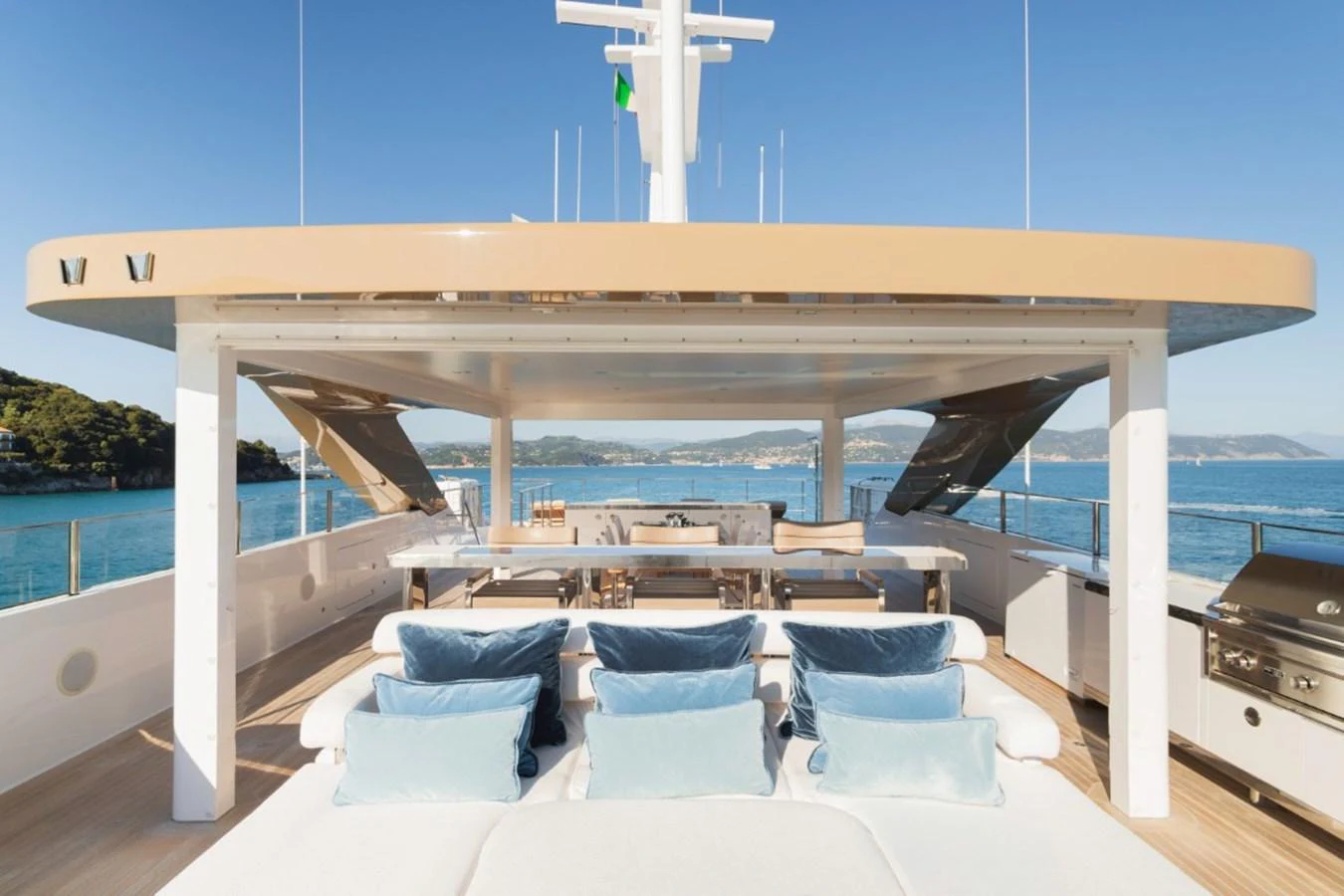 The sundeck offers a luxurious lounging area with plush seating and panoramic views. aboard PICK UP Yacht for Sale