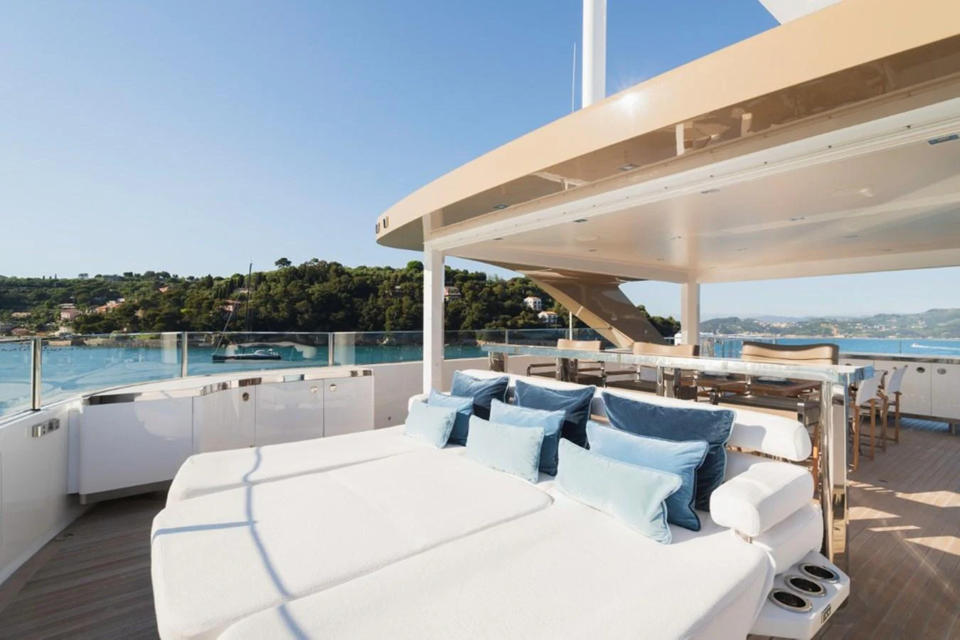 The sundeck offers a luxurious lounging area with plush seating and stunning views. aboard PICK UP Yacht for Sale