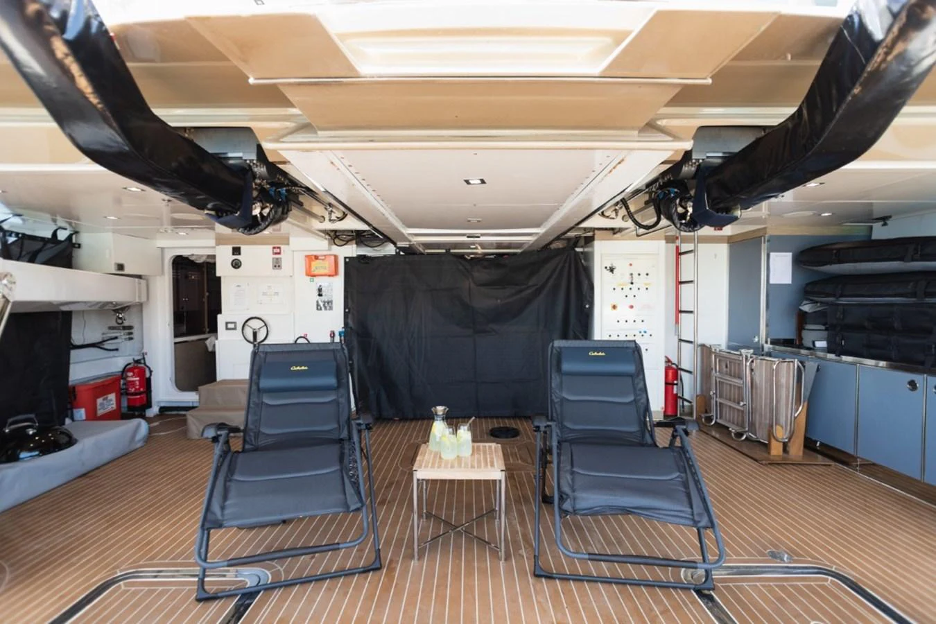 The yacht's garage features comfortable seating and ample storage space. aboard PICK UP Yacht for Sale
