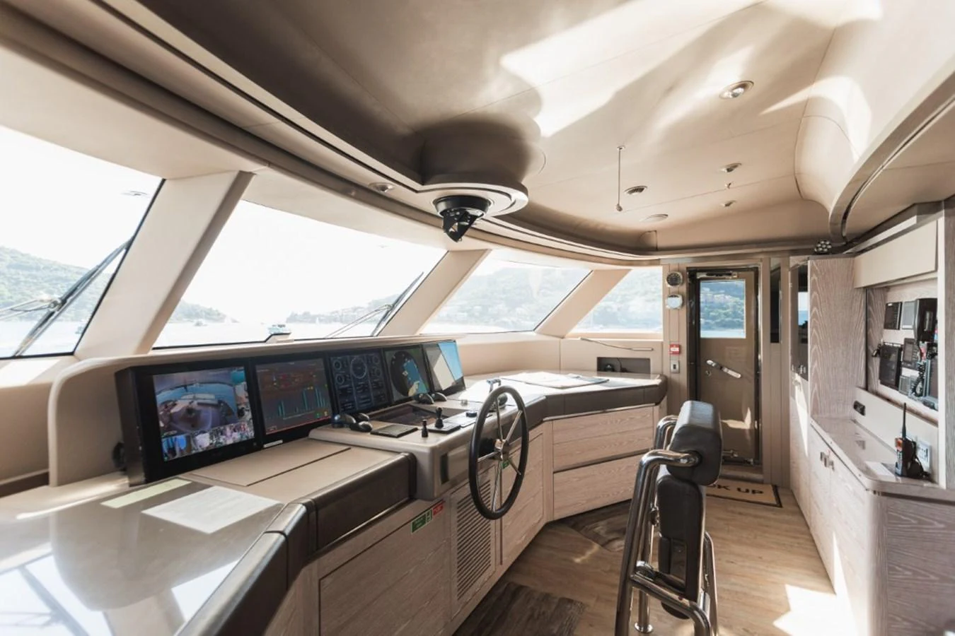 The helm station features advanced navigation equipment and a panoramic view. aboard PICK UP Yacht for Sale