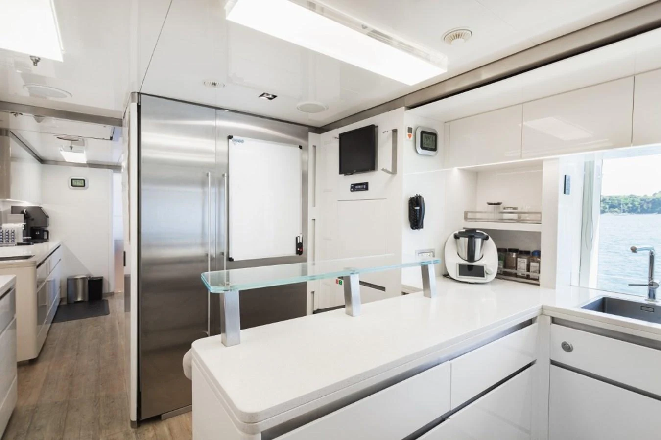 The yacht's galley features modern appliances and a sleek design with ample counter space. aboard PICK UP Yacht for Sale