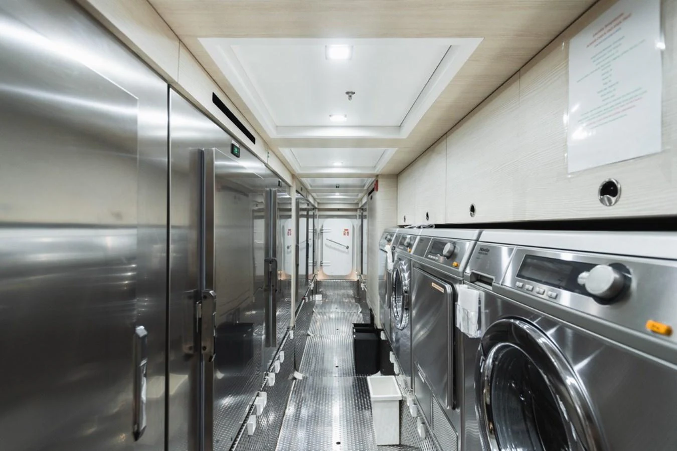 The yacht features a well-equipped laundry room with modern appliances. aboard PICK UP Yacht for Sale