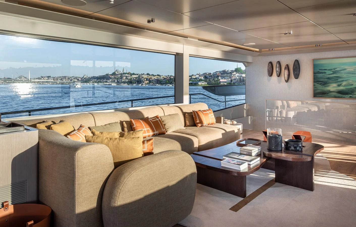 The salon offers a spacious and luxurious seating area with panoramic views of the water. aboard NUMARINE 27XP#6 Yacht for Sale