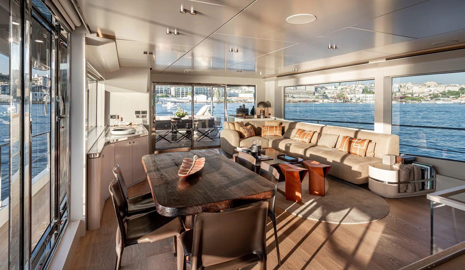 The spacious salon offers panoramic views and luxurious comfort with modern furnishings. aboard NUMARINE 27XP#6 Yacht for Sale
