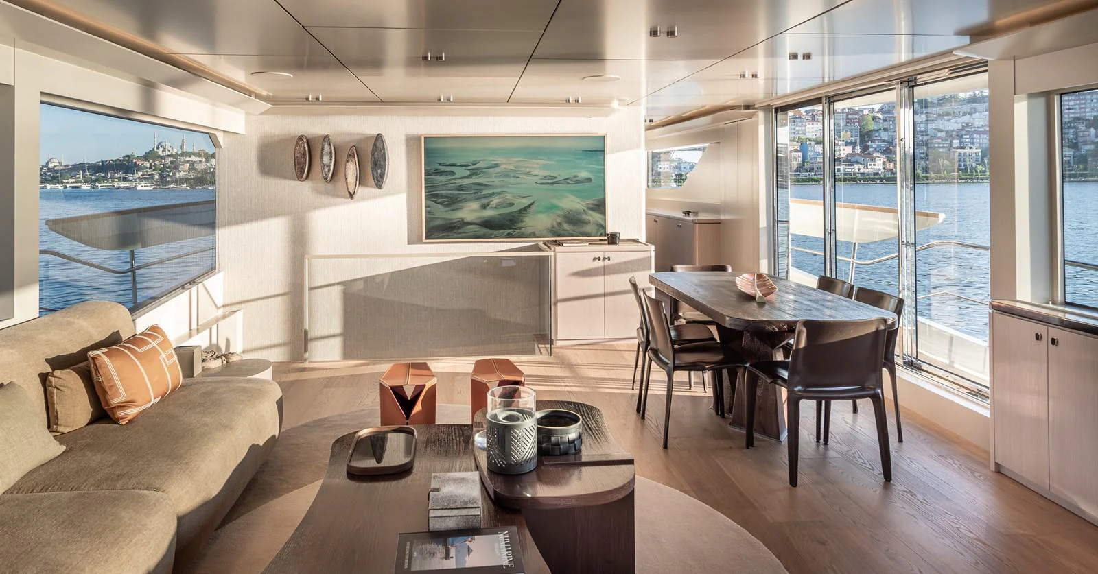 The salon offers a spacious and elegant area with panoramic views and luxurious furnishings. aboard NUMARINE 27XP#6 Yacht for Sale