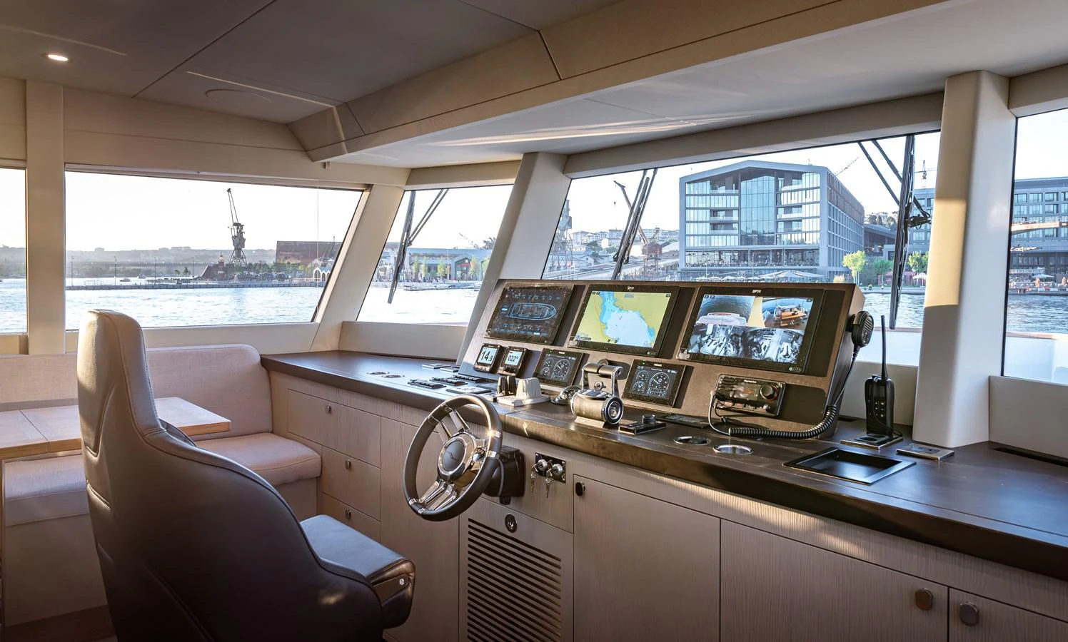 The helm station offers panoramic views and state-of-the-art navigation equipment. aboard NUMARINE 27XP#6 Yacht for Sale
