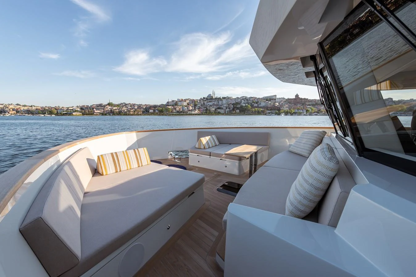 The yacht's aft deck offers a spacious and comfortable lounging area with scenic views. aboard NUMARINE 27XP#6 Yacht for Sale