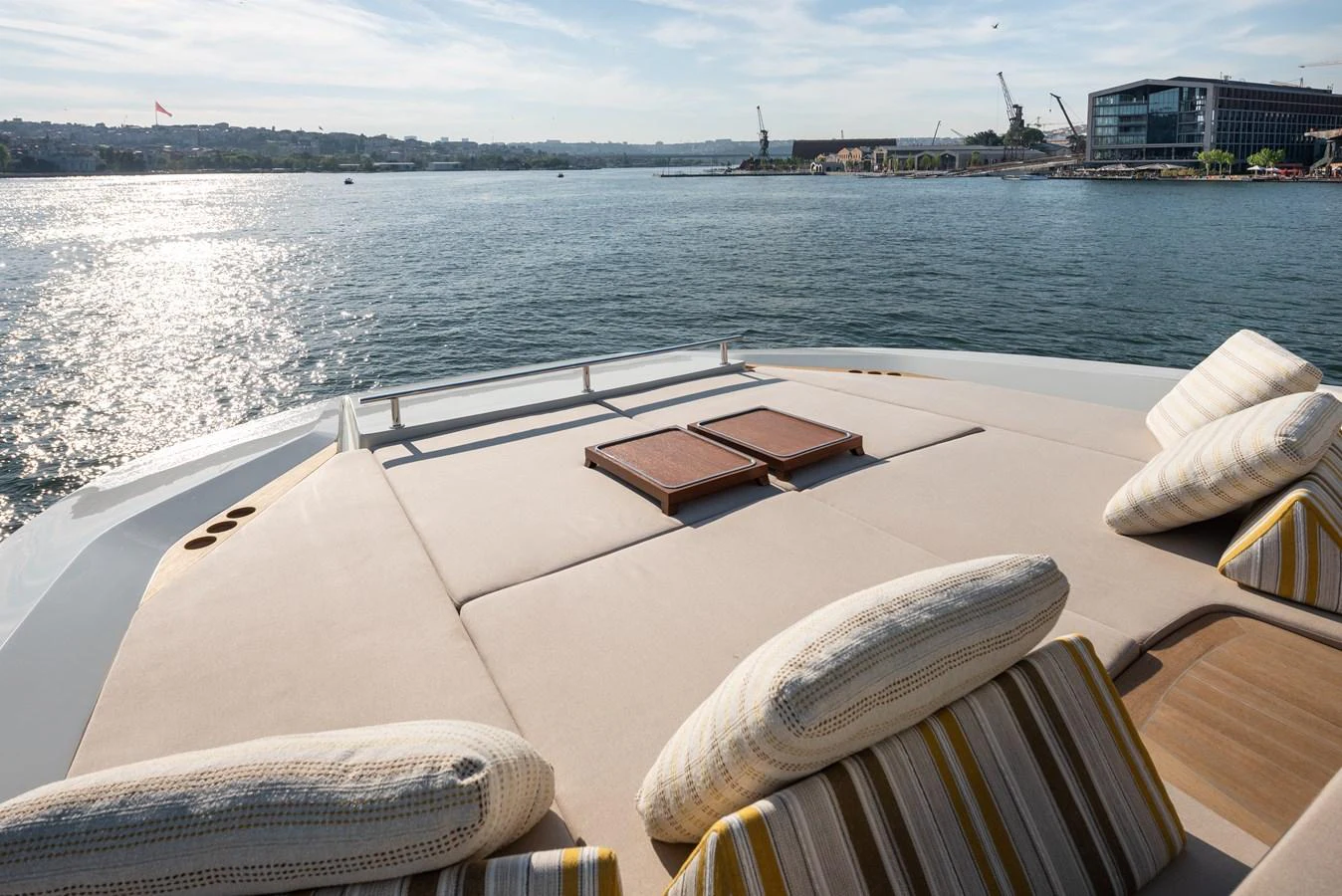 The sundeck offers a spacious and comfortable lounging area with a stunning view of the water. aboard NUMARINE 27XP#6 Yacht for Sale