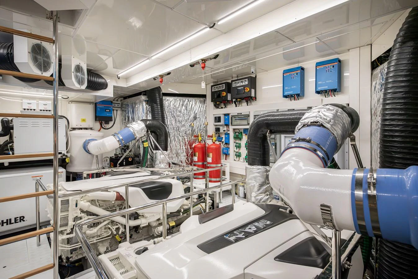 The engine room showcases advanced machinery and meticulous organization, ensuring optimal performance and reliability. aboard NUMARINE 27XP#6 Yacht for Sale