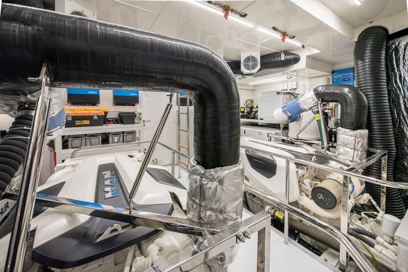 The engine room showcases advanced machinery and meticulous organization. aboard NUMARINE 27XP#6 Yacht for Sale