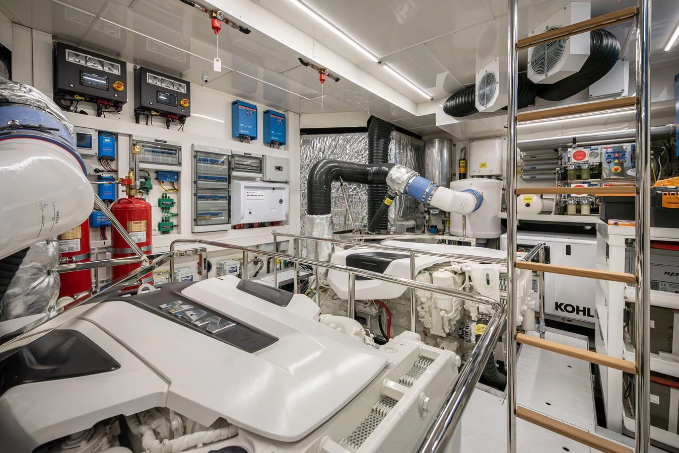 The engine room is meticulously organized, showcasing advanced machinery and equipment. aboard NUMARINE 27XP#6 Yacht for Sale