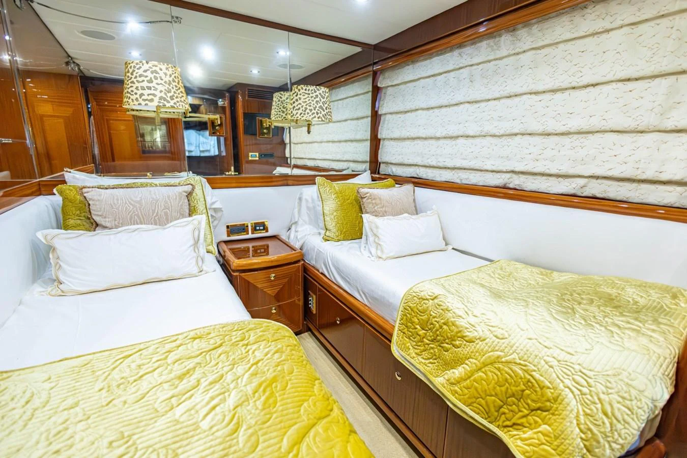 This inviting guest stateroom features twin beds with luxurious bedding and elegant decor. aboard MY ANGEL Yacht for Sale