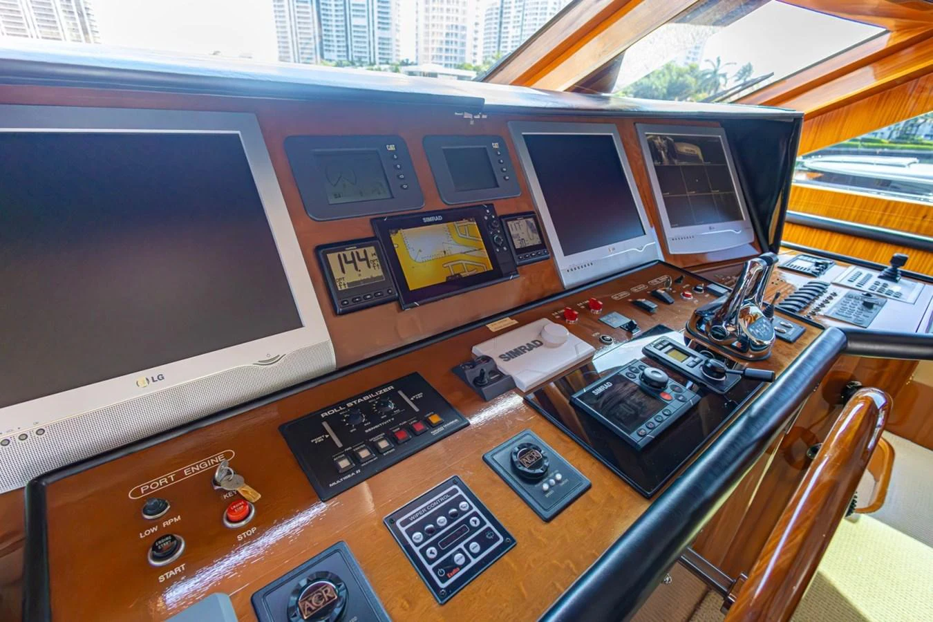 The helm station features advanced navigation equipment and luxurious wood finishes. aboard MY ANGEL Yacht for Sale