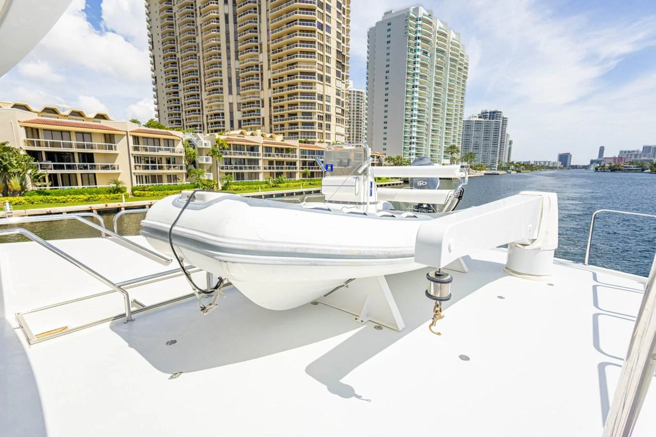 A sleek tender is securely positioned on the yacht's deck, ready for deployment. aboard MY ANGEL Yacht for Sale