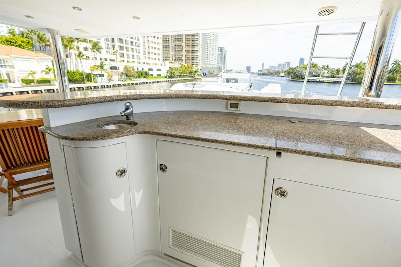 The yacht's galley features a sleek countertop with a built-in sink, offering a functional and stylish space for meal preparation. aboard MY ANGEL Yacht for Sale