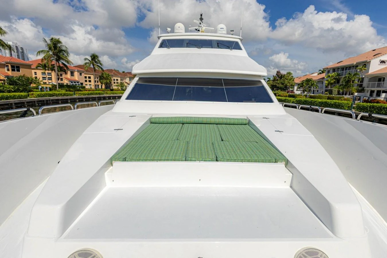 The yacht's sleek exterior is showcased with a focus on the foredeck area. aboard MY ANGEL Yacht for Sale