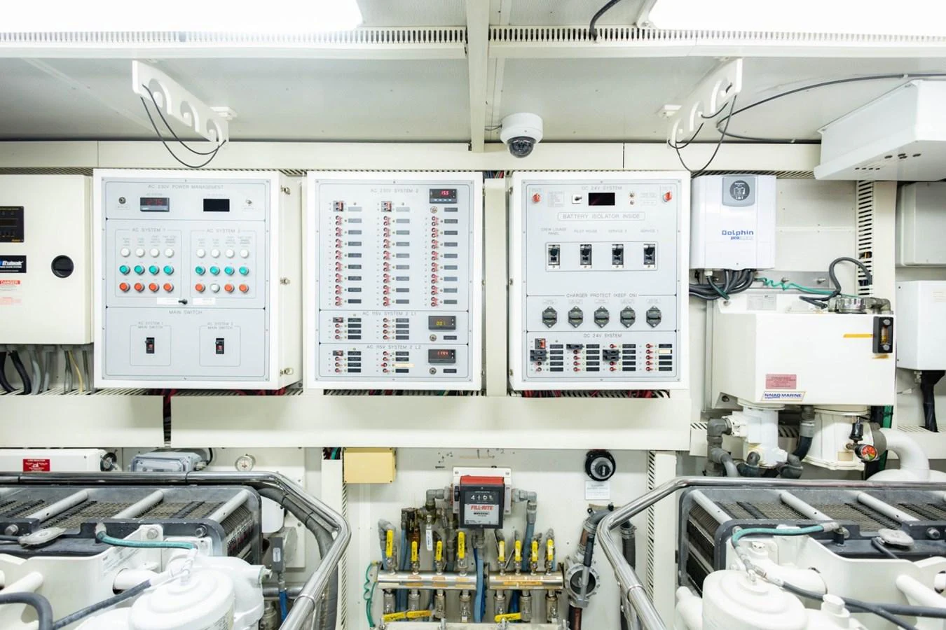 The engine room features a well-organized control panel and machinery setup. aboard MY ANGEL Yacht for Sale