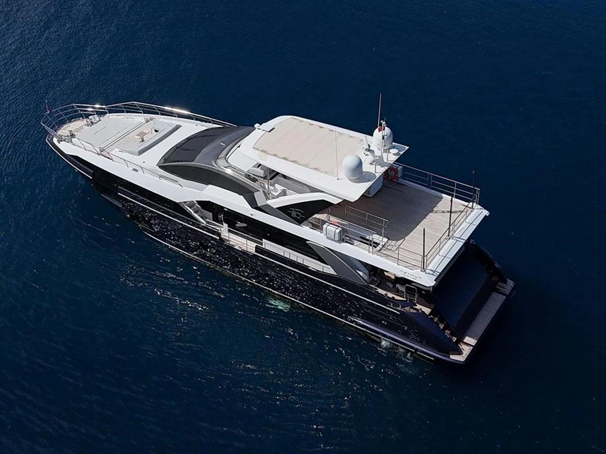 A sleek and modern yacht cruising on calm blue waters. aboard ALEX10 Yacht for Sale