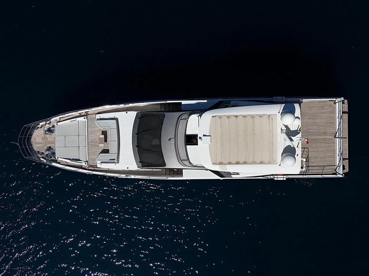 Aerial view of a sleek yacht showcasing its elegant design and spacious deck areas. aboard ALEX10 Yacht for Sale