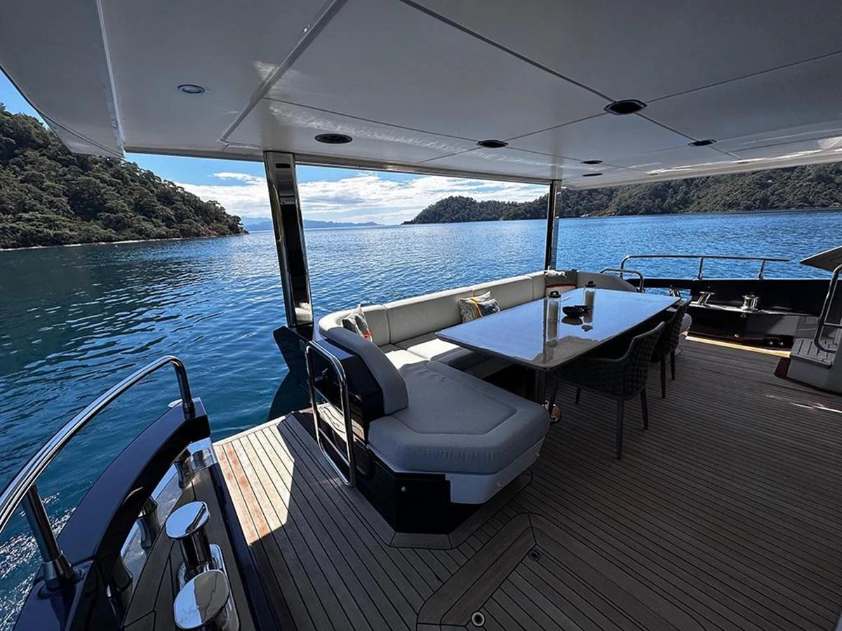 The aft deck offers a spacious and comfortable seating area with stunning views of the surrounding waters. aboard ALEX10 Yacht for Sale
