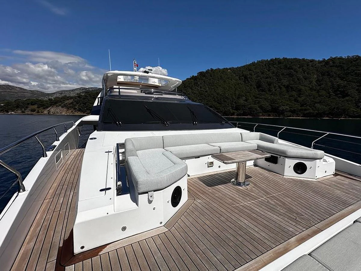 The foredeck features a spacious and stylish seating area with a sleek design. aboard ALEX10 Yacht for Sale