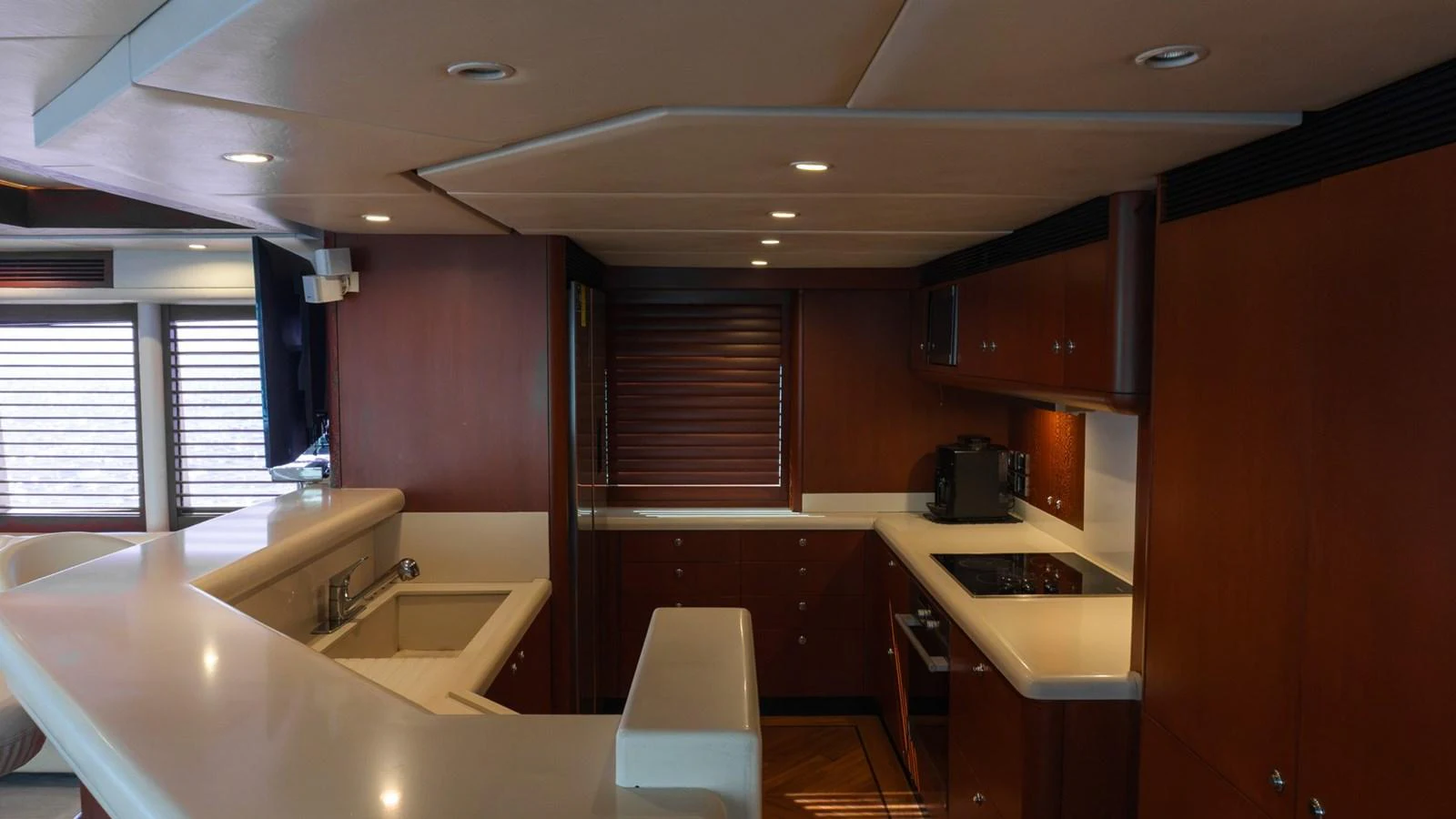 The galley features modern appliances and ample counter space for meal preparation. aboard AUSSIE RULES Yacht for Sale