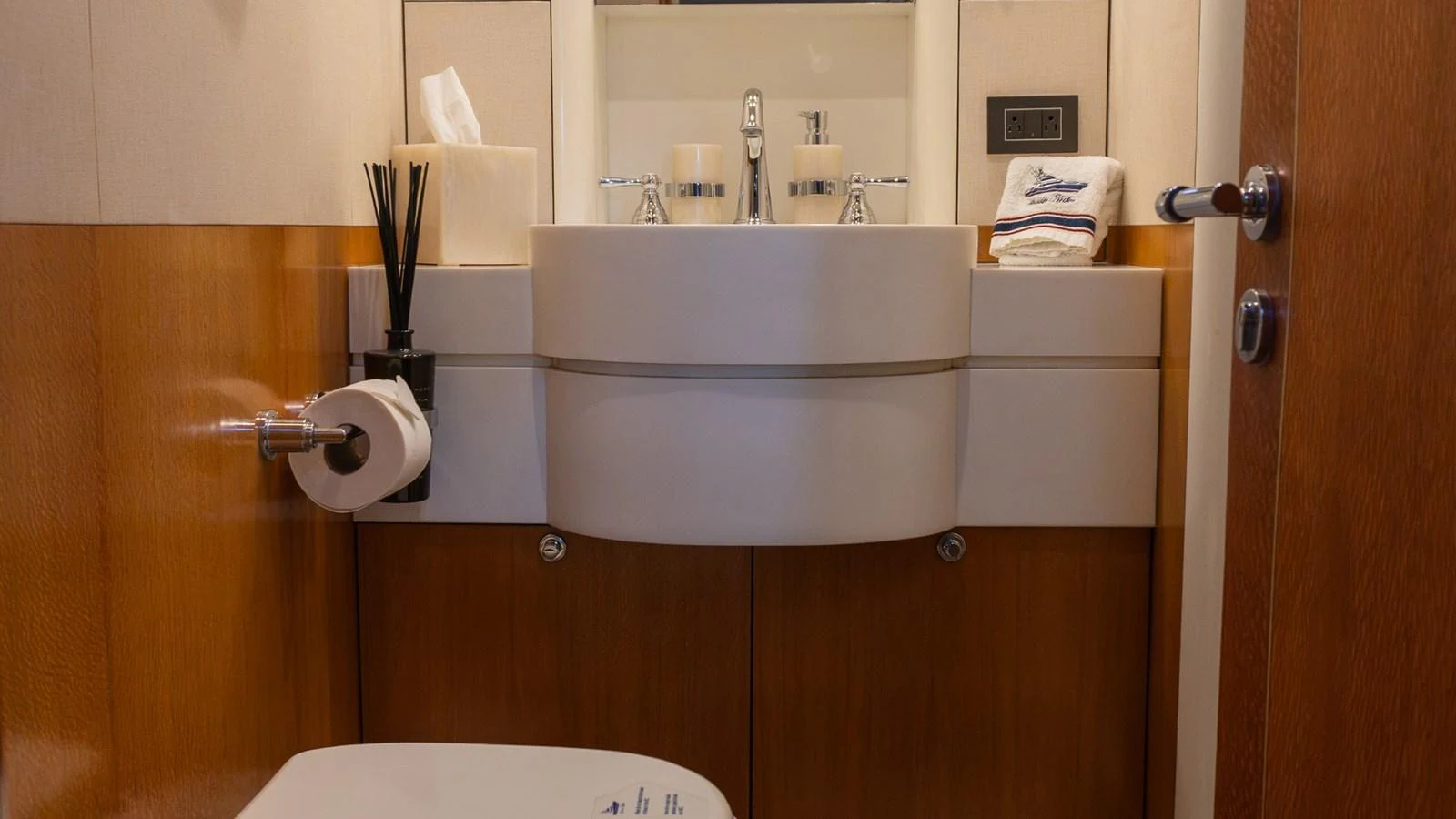 The yacht's bathroom features modern fixtures and a clean design. aboard AUSSIE RULES Yacht for Sale
