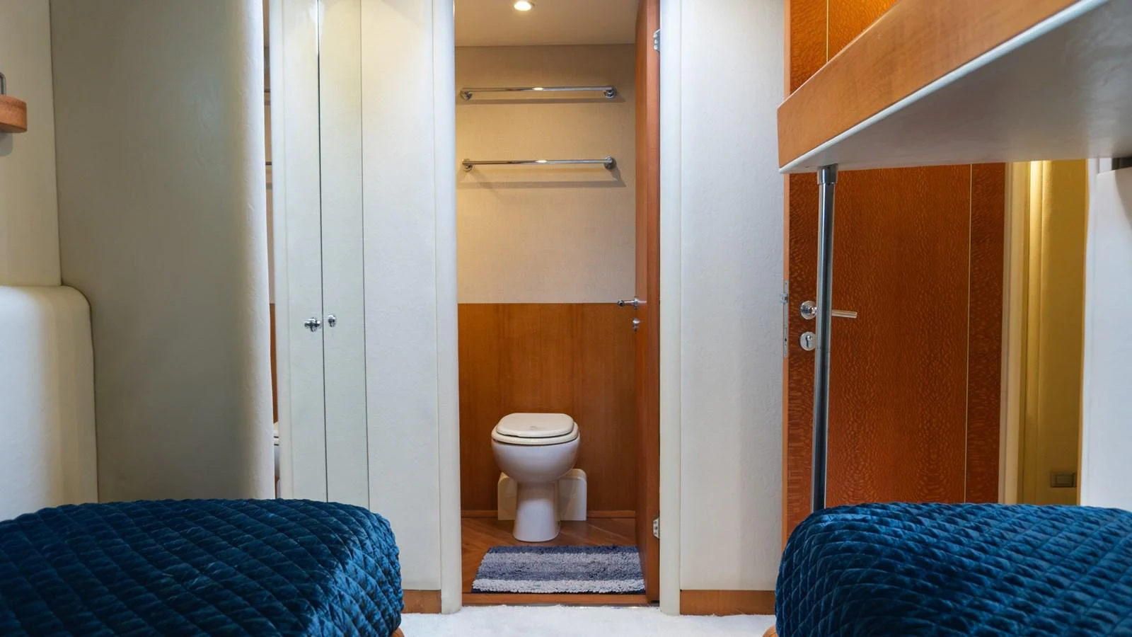The guest cabin features twin beds with a view into the ensuite bathroom. aboard AUSSIE RULES Yacht for Sale