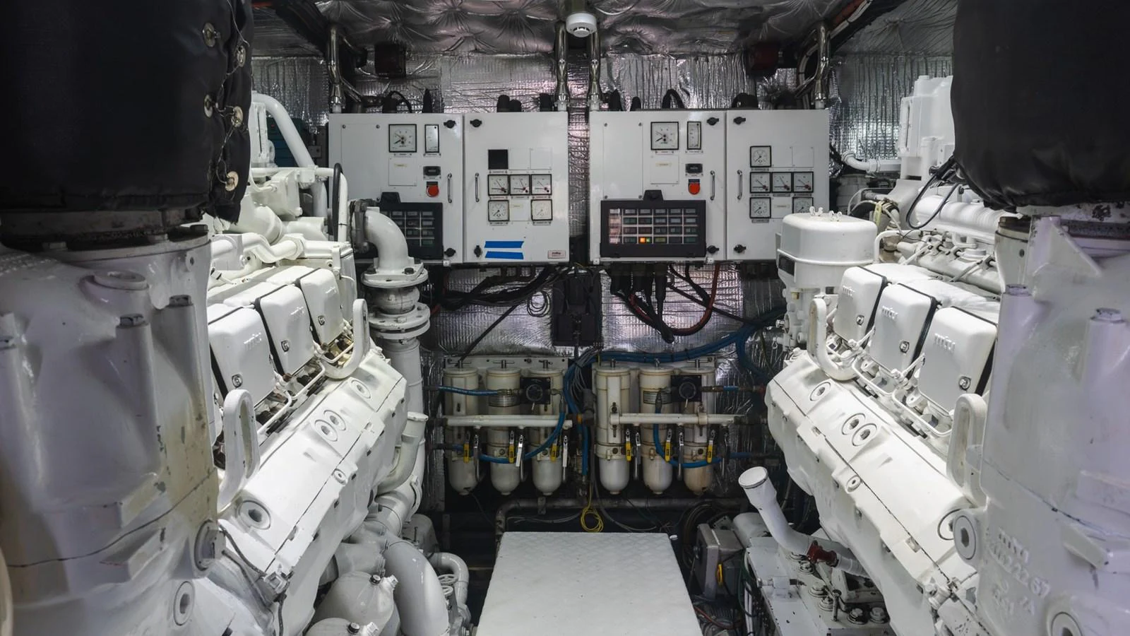 The engine room showcases powerful machinery and advanced systems for optimal yacht performance. aboard AUSSIE RULES Yacht for Sale