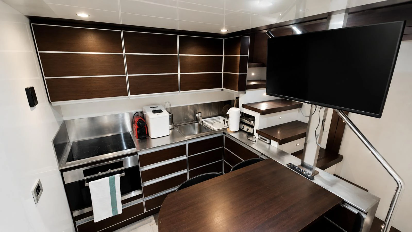 The sleek and modern galley is equipped with high-end appliances and ample storage space. aboard AMAR T Yacht for Sale