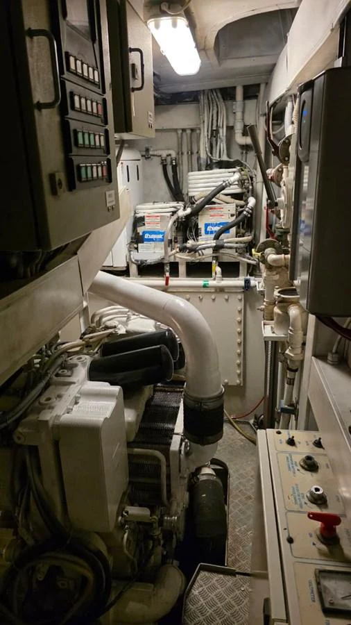 The image showcases the yacht's engine room, highlighting its mechanical components and systems. aboard AMAR T Yacht for Sale